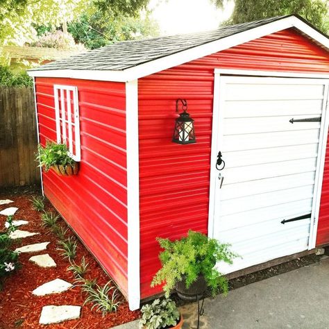 My wife wanted to update our old metal shed for a long time. We made a plan to go with a "red barn" look. We added paint, an old window, a flower box, fake hinges we found at Home Depot and did a little landscaping. We like how it turned out. The finished product. Fresh red paint, an old window, a flower box, solar lanterns, fake hinges and a little landscaping. The old medal shed that my wife hated looking at in our backyard. Red Wall Paint, Cool Sheds, Red Shed, Shed Makeover, Pallet Shed, Shed Decor, Simple Shed, Large Sheds, Shed Doors