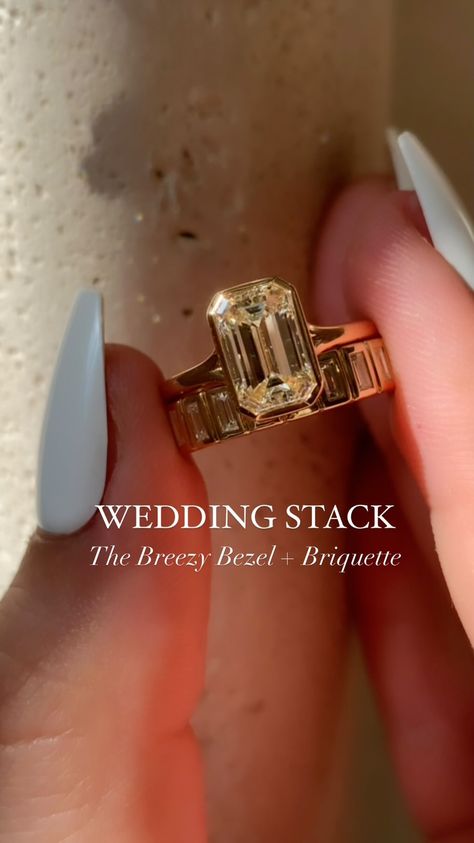 One of our fave recent wedding stacks has got to be the Breezy Bezel Emerald + Briquette combo. Matching not only their step cut emerald… | Instagram Thick Gold Band Engagement Ring Wedding Set, Vintage Engagement Ring With Band, Him And Her Wedding Rings, Bezel Wedding Ring Stack, Diamond Ring Styles, Bezel Ring With Wedding Band, Bezel Set Engagement Ring And Wedding Band, Emerald Bezel Engagement Ring Stack, Bezel Set Engagement Ring Stack