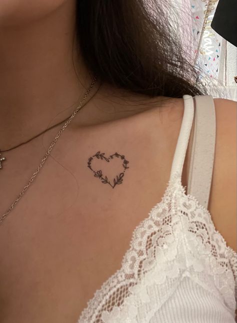 Hidden Tattoo For Women, Heart Tattoos On Chest, Cute Small Chest Tattoos For Women, Collarbone Tattoo Grunge, Collar Bone Tattoo Heart, Tattoo Ideas Female Under Breast, Front Chest Tattoo Female, Collarbone Name Tattoo, Chest Tattoo Heart