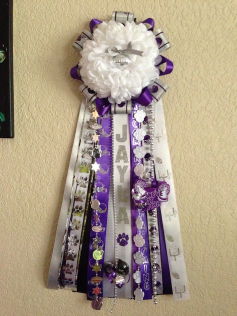 Senior Mums Homecoming White And Purple, Purple And White Homecoming Mum, Purple Mums Homecoming, Homecoming Mum Ideas, Big Homecoming Mums, Sleepover Stuff, Hoco Mums, Homecoming Mums Senior, Purple Mums