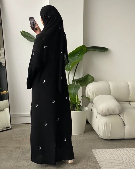 Beautiful Moon Embroidery Abaya With Hidden Button And Moon Embroidery Work Black Hijab 😍 Size Available - 50, 52, 54, 56, 58 Material- Premium Nida Fabric💯💓 Price - DM💫 . @azisha.in @azisha.in @azisha.in . . #azisha #trending #luxurylifestyle #luxuryaffordable #dubaiabayas #abayafashion #abayacollection #abayadubai #abayastyle #hijabfashion #hijabstyle #modestclothing #modestfashion #modestyfashion #explore #indianmuslims #muslimsoftheworld #fyp #fashion Abaya Designs Black, Embroidery Abaya, Black Abaya Designs, Moon Embroidery, Black Hijab, Black Abaya, Modesty Fashion, Abaya Designs, Muslim Fashion Outfits