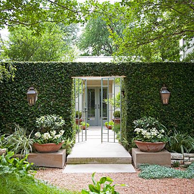 I like that the iron gate opens to a straight view of the fiberglass front door of the same color plus the surrounding rustic but very neat garden. Neat Garden, Front Courtyard, Courtyard Design, Beautiful Outdoor Spaces, Have Inspiration, Iron Gate, Gorgeous Gardens, Garden Fence, Garden Gates