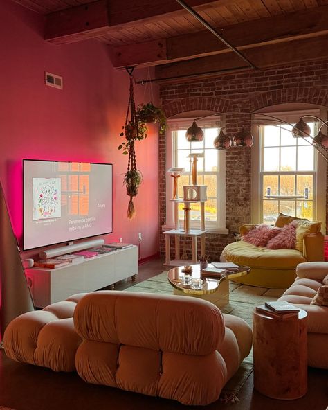 My living room makeover featuring moody pink walls, lots of vintage furniture, and little accents of colorful home decor.💖 Swipe to the end to see the wide view shot of the whole space. I don’t think I’ve ever shown this room from this perspective before, but she finally looks good from any angle.🤗 What do we think of the new look?? #apartmenttherapy #apartmentdecor #apartmenthunting #livingroomdecor #livingroommakeover #pinkhomedecor #girlydecor #eclecticdecor Cozy But Colorful Living Room, Living Room With Personality, Pink Studio Apartment Ideas, Cool Girl Living Room, Decorated Living Room, Pink Appartement, Living Room Into Bedroom, Party Living Room, Living Room Designs Y2k