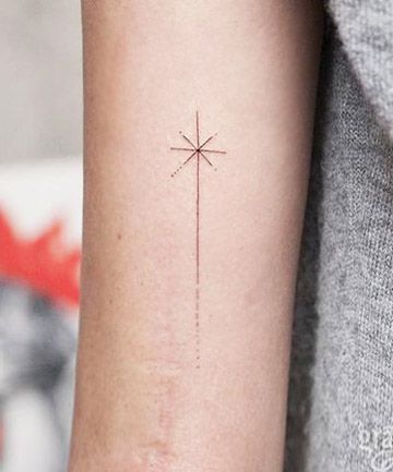 Minimalist Shooting Star North Star Tattoos, Shooting Star Tattoo, Minimalist Tattoo Meaning, Typography Tattoo, Light Tattoo, Star Tattoo, Zodiac Tattoos, Delicate Tattoo, Tattoo Equipment