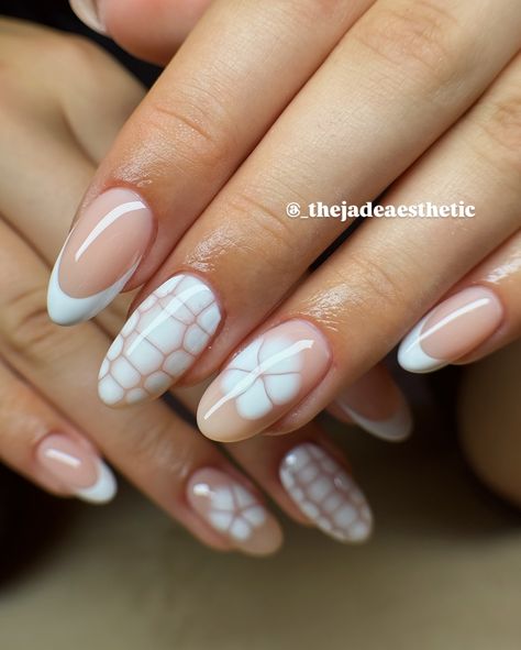 this set was literal perfection, 🤩 i have to say even tho it’s not super crazy art like i’ve done before, this has to be one of my best works ❤️ swipe to see every angle of these white blooming gel nails, from the apex and shape to a close up of that french tip! ✨ gel fill on natural nails w/ hand painted nail art <3 @stellar_gel - stellar bond - hard structure gel natural - stellar white - stellar blooming gel - stellar shine top @dndgel - dnd 871 how do u neutral? @the_gelbottle_inc ... Nail Blooming Gel Ideas, Blooming Gel French Tip Nails, Summer Blooming Gel Nails, White Blooming Gel Nails, French Tip With Nail Art, Nail Designs Blooming Gel, White Airbrush Nails, Blooming Gel Flowers, French Nail Inspiration