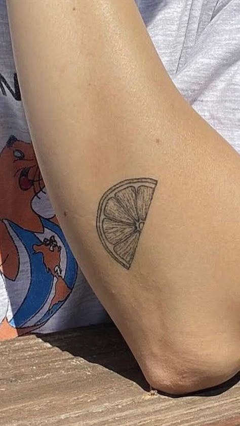 Minimalist Fruit Tattoo, Tangerine Slice Tattoo, Half An Orange Tattoo, Matching Orange Tattoos, Fruit Salad Tattoo, Black And White Lemon Tattoo, Lemon Slice Tattoo Minimalist, Orange Tattoo Fruit Black, Lemon Outline Tattoo