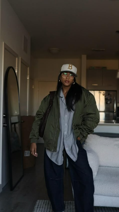 Nyc street style outfit inspo by @taylasnts with bomber jacket, oversized button down, & fitted hat Nyc Street Style, Nyc Street, Stylish Work Attire, Neutral Outfit, Baddie Outfits Casual, Cute Simple Outfits, High Fashion Street Style, Fall Fashion Outfits, Fitted Hat