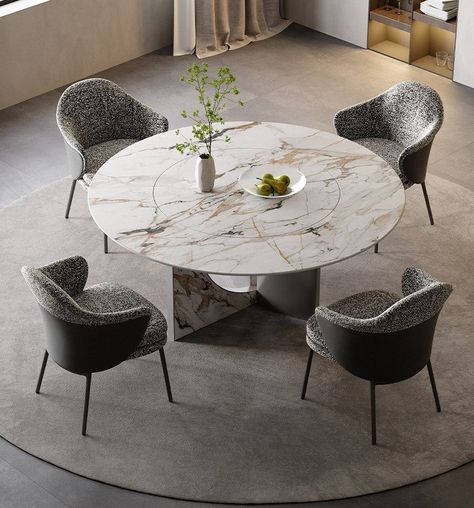 Product Description The Celestia Marble Elegance Dining Table is an exquisite centerpiece designed to elevate any modern dining space with its elegance and style. This table features a large, round top made from premium quality sintered stone, characterized by its striking white background and bold grey veining, ensuring that no two pieces are exactly alike. The sintered stone top is supported by a robust and uniquely shaped base, which is also clad in matching for a seamless, luxurious look. Th Circle Marble Dining Table, Round Luxury Dining Table, Circle Dining Table Design, Marble Dinner Table, Waiting Room Furniture, Circle Dining Table, Round Marble Dining Table, Round Dining Room Table, Cozy Furniture