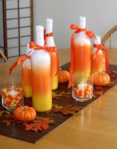 Candy Corn spray painted bottles Spray Painted Bottles, Painted Bottles, Painted Wine Bottles, Theme Halloween, Wine Bottle Crafts, Colorful Candy, Bottle Painting, Fete Halloween, Diy Halloween Decorations