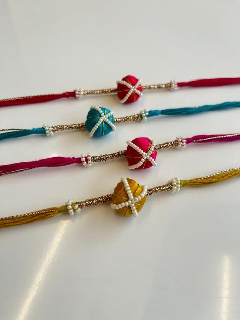 To buy this please DM or contact us on +91 9725445473 WhatsApp  #rakhi #handmade #fashion #rakhi2024 Rakhi Collection 2024, Beads Rakhi Designs, New Rakhi Designs 2024, Latest Rakhi Designs Handmade, Fabric Rakhi, Rakhi Designs Handmade, Rakhi 2024, Art Competition Ideas, Handmade Rakhi Designs