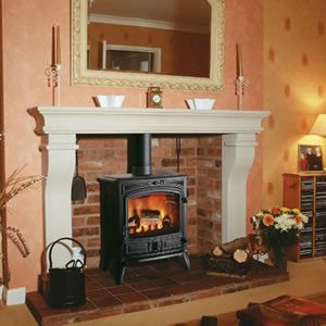 On a low hearth. Fire Feature Wall, Wall Gas Fires, Marble Hearth, Granite Hearth, Modern Wood Burning Stoves, Fireplace Trim, Inset Stoves, Inset Electric Fires, Fireplace Fronts