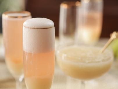 Pear Bellini Recipe | Damaris Phillips | Food Network Pear Bellini Recipe, New Years Eve Drinks, Bellini Recipe, Citrus Cocktails, Roasted Pear, Cranberry Cocktail, Food Network Canada, Berry Cake, Margarita Recipes