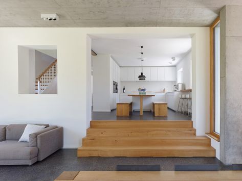 Holzer Architekten adds black extension to 1920s house in Stuttgart Split Level Home Designs, Split Level Kitchen, Add A Room, Sunken Living Room, 1920s House, Modern Extension, Split Level House, Hip Roof, Up House