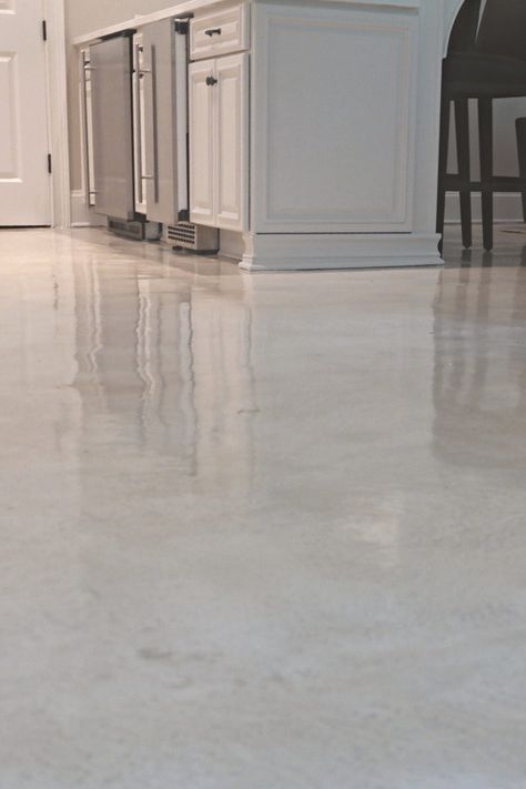 For high-traffic areas of your home, our MarbleKoat finish is an exceptional option. This non-staining and low-maintenance flooring keeps your home cleaner, safer, and offers long-lasting durability. Polished Concrete Floors Kitchen, Concrete Floor In Kitchen, White Stained Concrete Floors, Light Stained Concrete Floors, Concrete Floors Kitchen, Polished Concrete Floor Kitchen, Light Concrete Floors, White Concrete Floors, Finished Concrete Floors