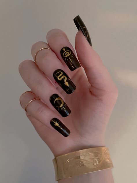 🌙✨ I think you can never have enough gold This design is available as a custom press on ✨ See bio for more details * * * #gelnails #nailart #nailsofinstagram #nailartist #gelxnails #longnails #nailpolish #gel #pressons #nailsoftheday #candycoat #instanails #throwbacknails #pressonnails #dagstormnails #goldnails #witchnails #fallnails #halloweennails #gothnails Gold Nail Polish Designs, Goth Halloween Nails, Gothic Nail Art, Black Gold Nails, Black Halloween Nails, Chrome Design, Witch Nails, Witchy Nails, Gold Nail Polish