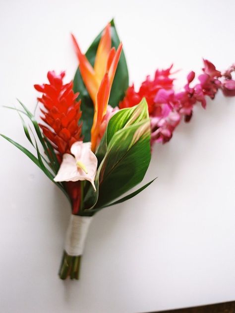 A Myrtle Beach oceanside wedding featuring bright coral bridesmaids dresses and tropical bouquets filled with protea and orchids. Tropical Wedding Dinner Table, South Beach Wedding Theme, Tropical Boutineer, Tropical Bridal Bouquet, Tropical Wedding Bouquets, Tropical Wedding Theme, Tropical Wedding Inspiration, Coral Bridesmaid, Tropical Florals