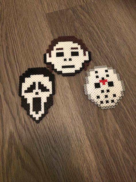 Three Spooky Horror Villains Done in Perler Beads Horror Movie Perler Beads, Movie Perler Beads, Bead Characters, Halloween Perler, Perler Bead Designs, Melty Bead Patterns, Pearl Beads Pattern, Horror Villains, Easy Perler Beads Ideas