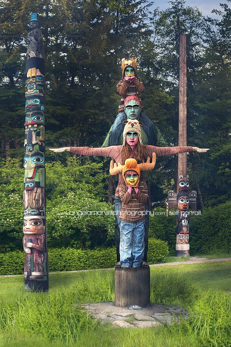 Creative self portraits of a family as a totem pole in Ketchikan Alaska  Angela Marvel Photography | Self Portraits Family Totem Pole, Marvel Photography, Angela Marvel, Clay Totems, Ceramic Totems, Totem Pole Art, Self Portrait Artists, Creative Self Portraits, Ketchikan Alaska