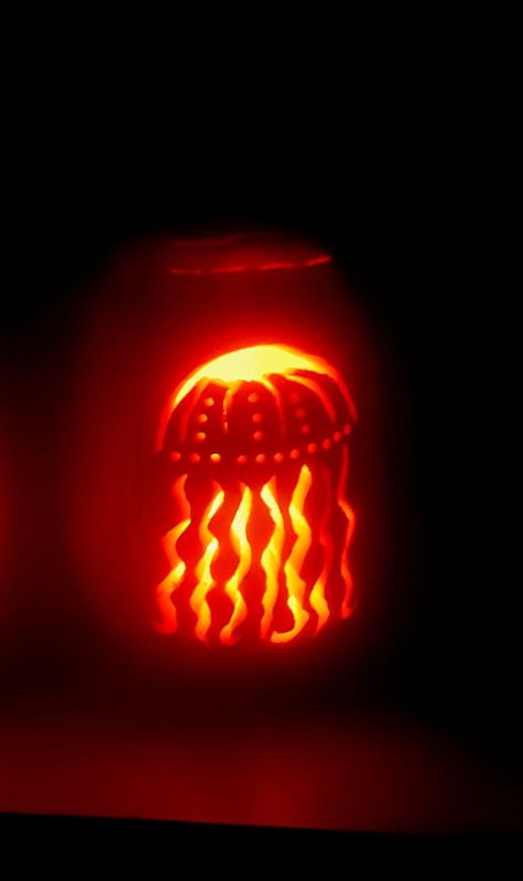 Sea Creature Pumpkin Carving, Flame Pumpkin Carving, Tropical Pumpkin Carving Ideas, Pumpkin Carving Octopus, Jelly Fish Pumpkin, Jellyfish Pumpkin Carving, Fish Pumpkin Carving Ideas, Pumpkin Carve Designs, Beach Pumpkin Carving