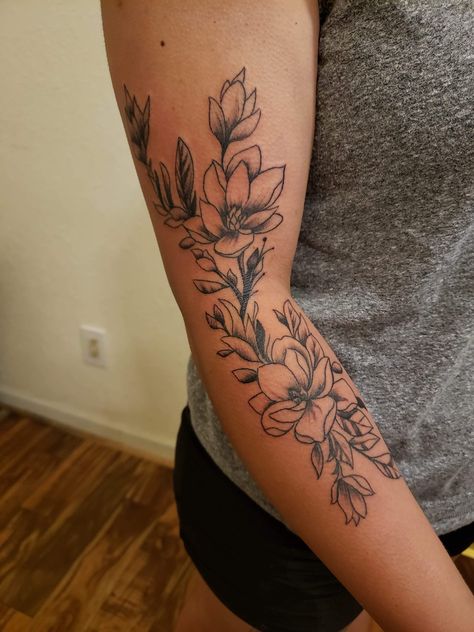 Flower Mid Arm Tattoo, Inside Arm Flower Tattoo, Big Upper Arm Tattoos Women, Flower Tattoo Behind Arm Above Elbow, Floral Top Arm Tattoo, Asher Flower Tattoo, Back Of Arm Bouquet Tattoo, Outer Lower Arm Tattoos For Women, Outer Bicep Tattoos For Women