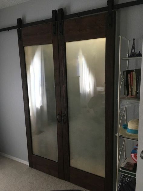 A few years ago we replaced our French patio doors, and being the crafter I am, I saved the glass to be used later. Well this is later, and I decided to use the glass to make sliding barn doors for the master closet. If you don’t already have some glass to repurpose, head to your local Habitat Restore and you can find old patio doors for fairly cheap. Here are our old glass panels, tucked between our shed and fence until I found a use for them.Other supplies you will need:-table saw… French Patio Doors, Mirror Barn Door, Habitat Restore, French Patio, Space Saving Hacks, Building A Barn Door, Bifold Barn Doors, Diy Sliding Barn Door, Garage Sale Finds