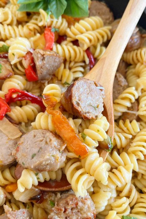 This Sausage and Peppers Pasta Recipe combines leftover Italian sausage, bell peppers and onions with pasta for a quick and easy meal perfect for busy weeknights. A delicious dinner the whole family will love! Leftover Sausage, Peppers Pasta, Sausage And Peppers Pasta, Quick And Easy Pasta Recipes, Enchilada Dip, Easy Dinner Recipe Ideas, Best Easy Dinner Recipes, Easy Meals For Families, Instant Pot Pasta