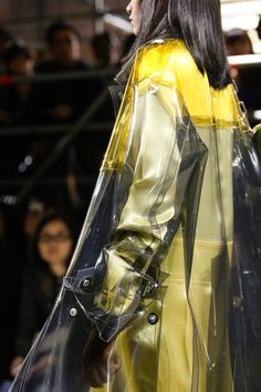 #fashion #outfit #plastic #plastictrend #clear #clearraincoat #raincoat #trends #womenfashion #transparent #plasticclothing Plastic Raincoat, Futuristic Fashion, Raincoats For Women, Future Fashion, Fall 2014, Fashion Shows, Rain Wear, Black Vinyl, Fashion Details