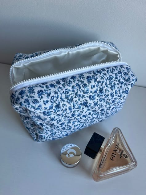 blue floral cosmetic bag Blue Pouch Bag, School Aesthetic Girl, Coastal Room Ideas, Belly Conklin Aesthetic, Blue Wonyoungism, Hibiscus Necklace, Aesthetic Pencil Case, Blue Pencil Case, Makeup Bag Blue