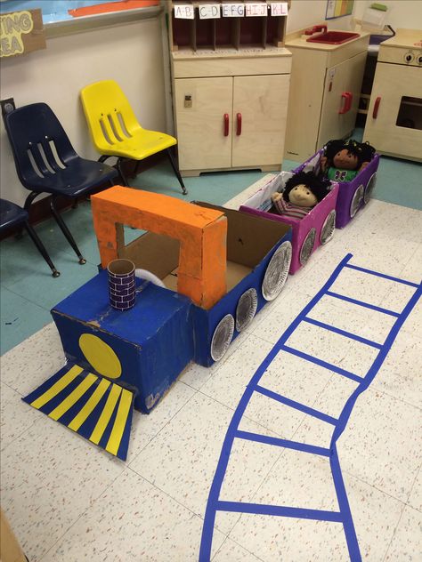 Train made out of card board boxes in my dramatic play center  #train Trains Eyfs Activities, Train Preschool Theme, Train Provocations, Train Ideas For Preschool, Train Dramatic Play Preschool, Transportation Theme Dramatic Play, Transportation Theme Preschool Dramatic Play, Train Dramatic Play, Bus Dramatic Play