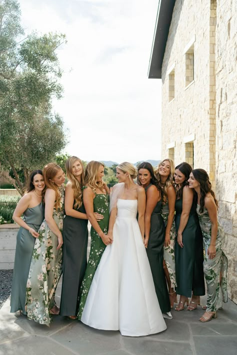 classic bride in an elegant strapless wedding dress with her bridal party in mismatched floral and solid green bridesmaid dresses Green Long Bridesmaid Dress, Green And Taupe Bridesmaid Dresses, Monochromatic Bridal Party, May Wedding Bridesmaids Dresses, Elegant Green Bridesmaid Dresses, Mis Matched Bridesmaid Dresses, Bridesmaid Dresses Pallet, Mix And Match Bridal Party, Emerald Mismatched Bridesmaids