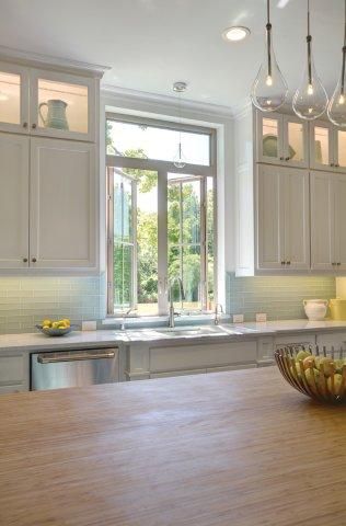 Casement windows combined with a transom on top brings in lots of light in this beautiful kitchen. Featured: Tuscany® Series Kitchen Window Over Sink Ideas, Kitchen Windows Above Sink Ideas, Kitchen Windows Above Sink, Window Over Kitchen Sink, Window Above Sink, Farm Kitchen Ideas, Above Kitchen Sink, Window Over Sink, Kitchen Sink Window