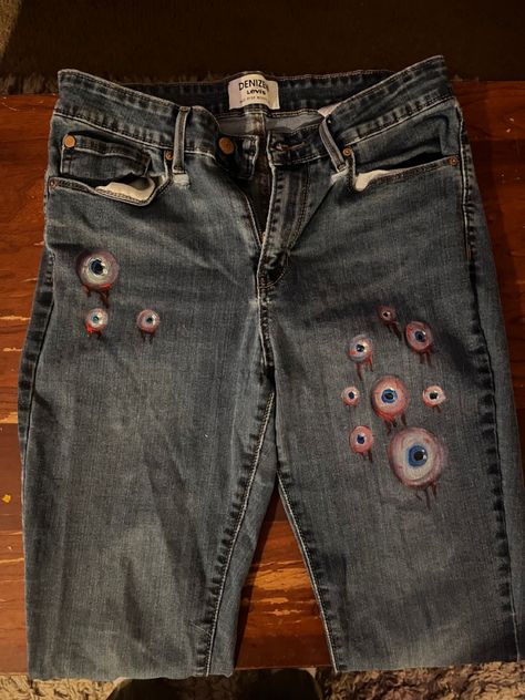 Jean Hole Patch Ideas, Hand Painted Patches, Clothing Modifications, Creepy Eyeball, Clothing Diys, Denim Painting, Bug Pants, Hand Painted Jeans, Creepy Clothes