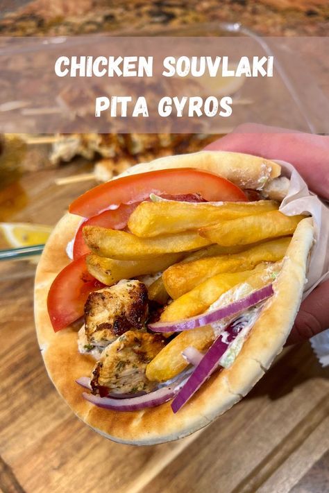 This easy Greek Chicken Souvlaki Wrap tastes just like the ones in Athens with marinated pieces of chicken, fresh veggies, tzatziki sauce, and fries wrapped in a warm pita. Chicken Souvlaki Wrap, Souvlaki Wrap, Chicken Skewers Grilled, Chicken Souvlaki Pita, Marinated Chicken Skewers, Easy Greek Chicken, Cucumber Uses, Spit Rotisserie, Greek Chicken Souvlaki