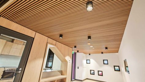 A Complete Guide to Using WPC Ceiling Panels Wpc Ceiling Design, Room Ceiling Design, Hidden Lighting, Timber Slats, Timber Ceiling, Elegant Lighting Fixtures, Interior Fit Out, Timber Panelling, Peaceful Living