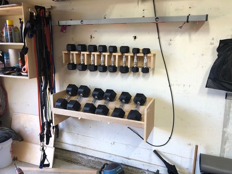 Used leftover plywood to create dumbbell storage in my garage. Huge space saver!!! Weight Storage Ideas, Open Closet Ideas, Home Gym Basement, Gym Organizer, Diy Gym Equipment, Dumbbell Storage, Ideas For Organizing, Home Gym Garage, Workout Room Home