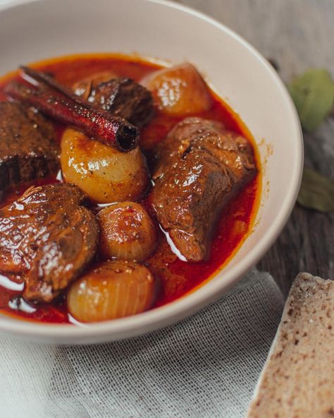 Stifado is a truly flavorful traditional Greek beef stew, slow-cooked in wine, with shallots, and sweet spices. #stew #beef #wine #stovetop #traditional Greek Beef Stew Recipe, Greek Beef Stew, Flavorful Beef Stew, Beef Stifado, Greek Beef, Shallots Recipe, Traditional Beef Stew, Meat Stew, Greek Cheese