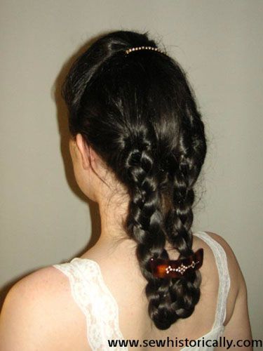 This tutorial will show you how to make this late 1870s/ early 1880s braided hairstyle. Part the hair into three sections: the front hair from ear to ear, and two hair sections at the back of the head. Braid each of the last into a braid, and join them in a loop. Hide the ends, … Continue reading 1878/ 1882 Braided Hairstyle Tutorial → 1870s Hairstyles, Braided Hairstyle Tutorial, Jessamine Lovelace, Cottagecore Hair, Hair Rat, Weird West, French Twist Updo, Half Updo Hairstyles, Updo Tutorial