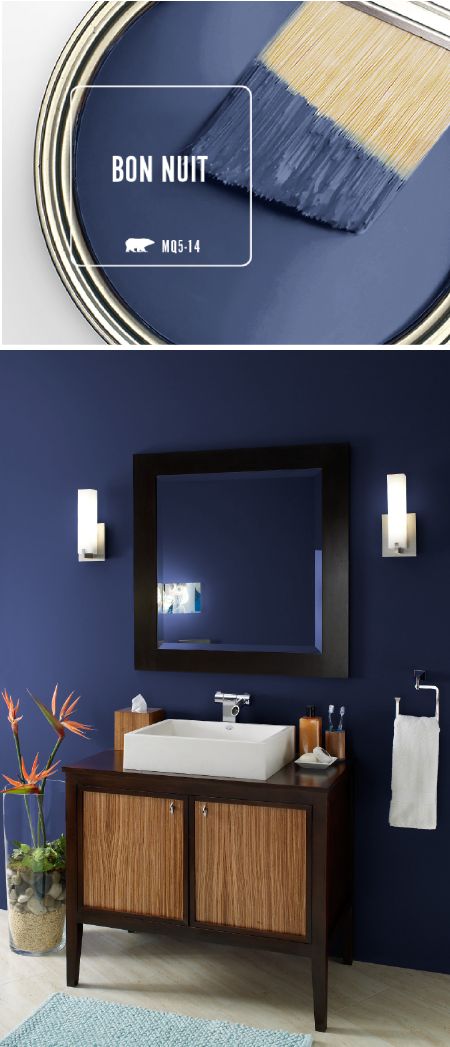 Bring a sense of elegance and drama into your home decor with the newest Color of the Month: BEHR Paint in Bon Nuit. This dark blue paint color evokes the feeling of the midnight summer sky on a clear night. This bathroom pairs the modern hue of this sapphire blue shade with black and wood accents to create a relaxing seaside spa vibe. Click to see more. Dark Blue Paint Color, Midnight Summer, Dark Blue Paint, Blue Accent Walls, Interior Design Minimalist, Behr Paint, Blue Paint Colors, Room Paint Colors, Bedroom Paint Colors