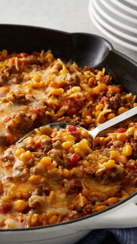 Need a quick-fix dinner that's ready to eat in 30 minutes? Look no further than this five-ingredient skillet dinner that has all of the great flavors of nachos. Shredded cheese, Spanish rice, ground beef, diced tomatoes and corn make this no-fuss dinner that couldn't be easier to make. Expert tip: Serve with a side salad or ripe avocados for a fresh addition. Ground Beef Diced Tomatoes, Beef Recipes Easy Quick, Quick Ground Beef Recipes, Beef Skillet, Ground Beef Recipes Healthy, Nachos Beef, Mexican Dinner, Beef Casserole Recipes, Spanish Rice