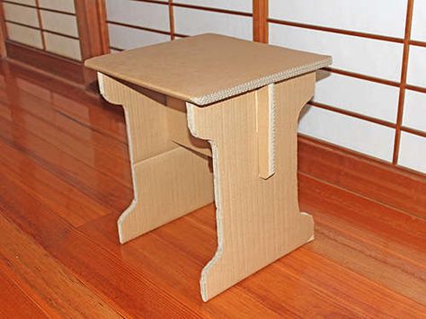 Simple end table made from cardboard. Cardboard Challenge, Cardboard Table, Cardboard Furniture Diy, Cardboard Fireplace, Cardboard Design, Paper Furniture, Cardboard Box Crafts, Cardboard Toys, Small End Tables