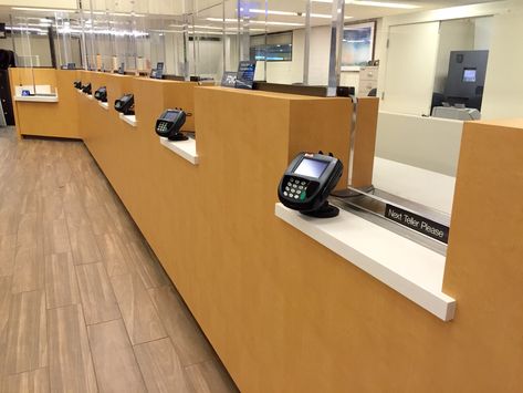 3M DI-NOC on bank teller stations.  Project by Eco-Surfacing Foils. Bank Cashier Counter Design, Bank Office Decor Ideas, Cashier Counter Design, Industrial Reception Desk, Bank Interior Design, Productive Office, Bank Teller, Reception Table Design, Banks Office