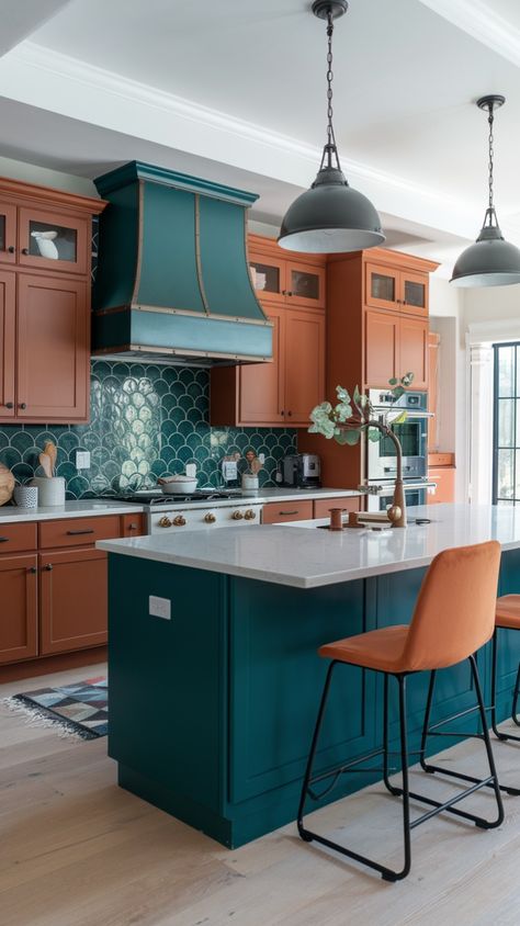 Striking color schemes such as deep teal, mustard yellow and terra cotta are the striking highlights of new contemporary kitchen themes. We suggest using bold colors in the lower cabinets but keeping them neutral in the upper cabinets for balance. Mix an arabesque tile backsplash with metal accents to create a bold focal point and complete the design. It is also a recommended design for homeowners who prefer a striking, bold kitchen that expresses their unique personality. Turquoise And Gold Kitchen, Teal Copper Kitchen, Mixed Color Kitchen Cabinets, Teal Cabinets Kitchen, Green Color Palate, Arabesque Tile Backsplash, Teal Cabinets, Contemporary Kitchen Ideas, Lower Cabinets