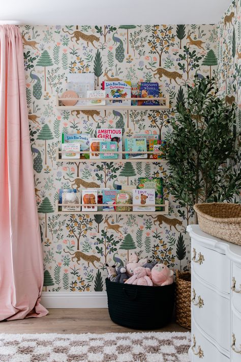 nursery bookshelves, whimsical wallpaper, blush curtains, checkered rug, nursery design, nursery decor, nursery inspo, playful nursery design Blush Velvet Curtains, Girl Nursery Inspiration, Playful Nursery, Nursery Bookshelves, Wallpaper Blush, Blush Curtains, Nursery Inspiration Girl, Whimsical Wallpaper, Nursery Bookshelf