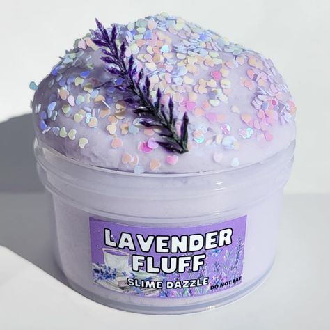 PRICES MAY VARY. Relaxing Cloud Slime Lavender Scented Great relaxing sensory slime for ages made in USA with non toxic ingredients CPC tested and ceritfied Scented with therapiutic grade lavender oil Lavender Fluff Relaxing Slime Lavender Scented TEXTURE: Cloud super drizzly easy to handle and relaxing to play with slime SCENT: Dreamy Lavender ADD-INS: Random Charm Each slime comes with 1 Activator Pen Spray FIXES STICKY SLIME 👍 1 per order If you need more activator you can purchase more at m Cool Slimes, Cloud Fluff, Fluff Slime, Sensory Slime, Cute Slime, Cheap Slime, Sticky Slime, Jelly Slime, Pretty Slime