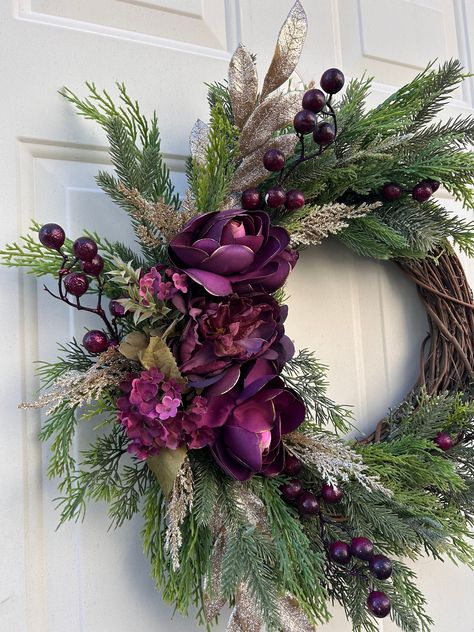 Elegance and radiant beauty are the main two elements of this design, crafted for the holiday season. Celebrate Christmas and ring in the new year with this glamorous and lush burgundy and gold roses wreath. This wreath shines by itself and adds a touch of class to your front door. The wreath can be used indoor over a mantle, kitchen cabinets, or even your bed.  The possibilities are endless. Free Shipping within the US Width: 20" Height: 20"  Depth : 3" **All wreaths are best kept out of the el Creative Wreaths Christmas, Christmas Wreaths For Front Door Rustic, Christmas Reath, January Wreath Ideas, Elegant Christmas Wreaths, Door Wreaths Christmas, Purple Christmas Wreath, Elegant Christmas Wreath, Christmas Wreath Designs