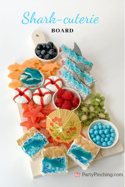 Shark-cuterie Board, best charcuterie board ideas for kids, best charcuterie board, cute charcuterie boards, best fruit trays, summer charcuterie, best summer charcuterie, shark week, shark fruit board, shark food, best shark party ideas, Little Debbie summer, Party Pinching Sharkcuterie Board, Shark Cuterie Board, Sharkuterie Board, Shark Week Food, Beach Desserts, Cuterie Board, Pool Entertaining, Cute Charcuterie, Shark Party Foods