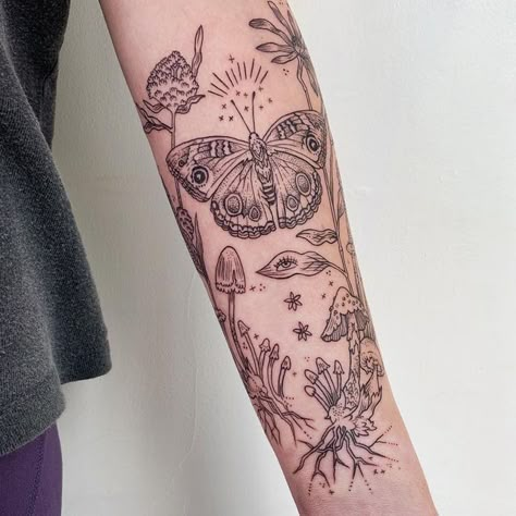 Black Lined Tattoos, Whimsical Fairy Tattoo Sleeve, Mushroom With Flowers Tattoo, Eye Flowers Tattoo, Buckeye Butterfly Tattoo, Mushroom And Butterfly Tattoo, Cottage Core Tattoo Sleeve, Mushroom Butterfly Tattoo, Mushroom Eye Tattoo