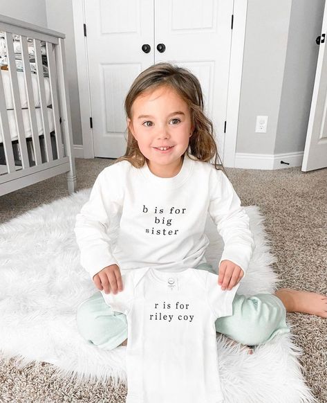 Cheerily on Instagram: “Aaand she has a name! R is for Riley Coy 💛 Due December 2021.⁠ ⁠ Big sis Maysen wearing our 'b is for big sister' crewneck, holding our…” B Is For Big Brother Announcement, B Is For Big Sister, Baby Announcement To Sister, B Is For Big Brother, Sibling Baby Announcements, Big Sister Announcement Shirt, Baby 2 Announcement, Sister Announcement, Big Brother Announcement