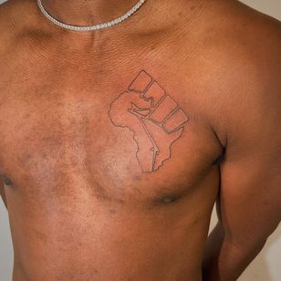 20 Powerful Africa Tattoos • Tattoodo Black Power Tattoo, Adinkra Tattoo, African Warrior Tattoos, Africa Tattoo, African Logo, Fist Tattoo, Roots Tattoo, Africa Tattoos, Tattoos Inspo