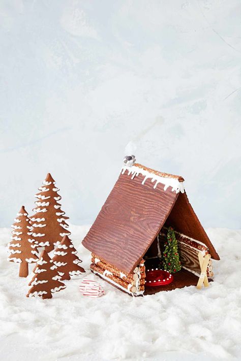 Our most beautiful gingerbread house ideas include grand mansions, cute cookie cottages, and intricately detailed cabins. Use our recipes and tips to create these impressive gingerbread houses for the holidays. Cookie Cottage, Miniature Ice Cream, Red Licorice, Spiral Pattern, No Bake Cookies, Martha Stewart, Licorice, Christmas Traditions, Gingerbread House